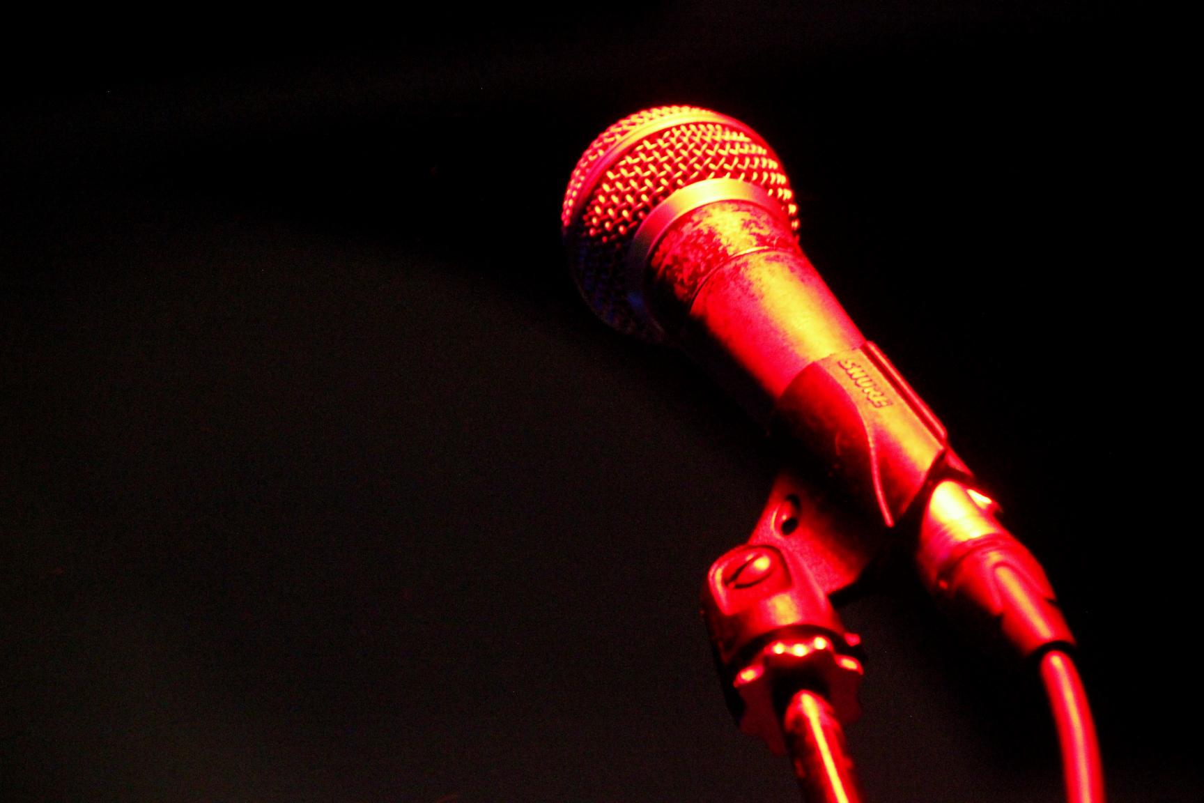 Microphone lit in red stage light